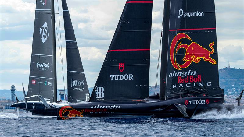 Alinghi Red Bull Racing and American Magic cross tacks. The lower section of Alinghi's mainsail is still riddled with tension creases , while the US Teams mainsail is much smoother - AC75  - Practice Session - Barcelona - August 15, 2024 - photo © Ian Roman / America's Cup